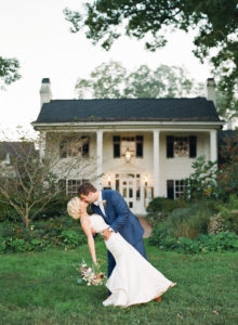annie and nathan in front of the fearrington house