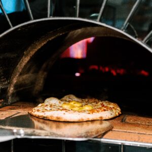 Roost is open! Join us every Friday from 5-7pm for live music, wood-fired pizza, and local brews as well as wine by the glass, snacks, and good company Bring your friends, some cash for tipping the musicians, and your appetite. We’ll see you under the oaks!