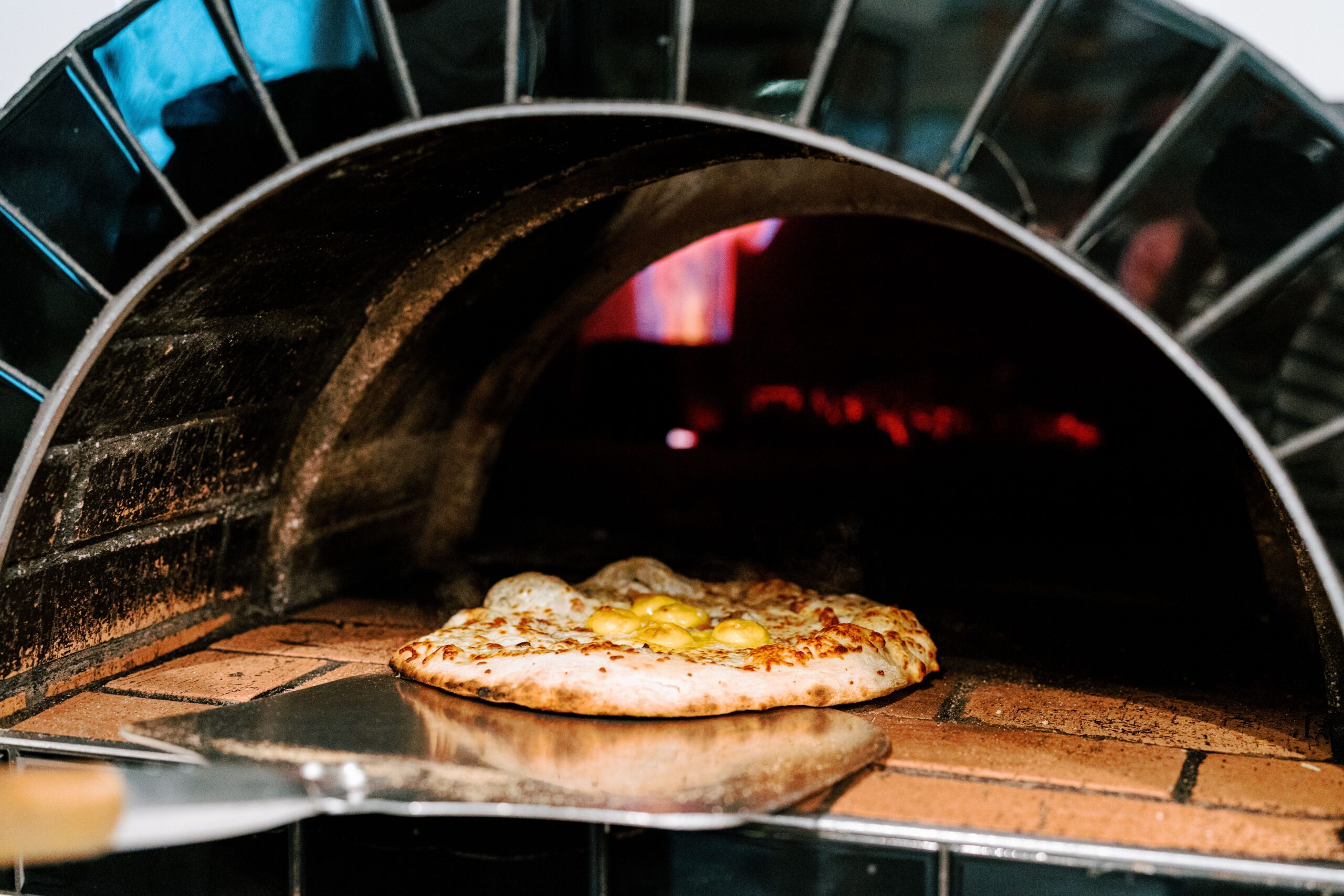 Roost is open! Join us every Friday from 5-7pm for live music, wood-fired pizza, and local brews as well as wine by the glass, snacks, and good company Bring your friends, some cash for tipping the musicians, and your appetite. We’ll see you under the oaks!