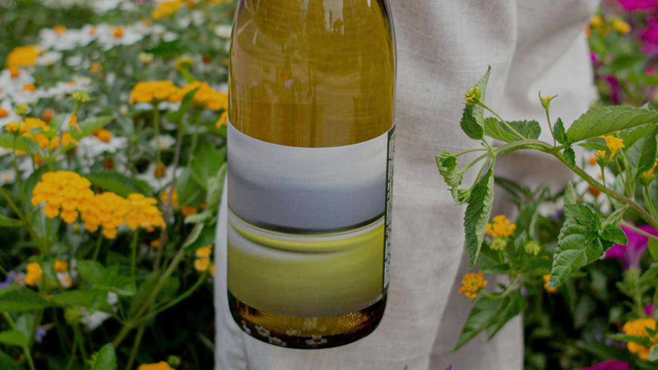 wine bottle in wildflowers